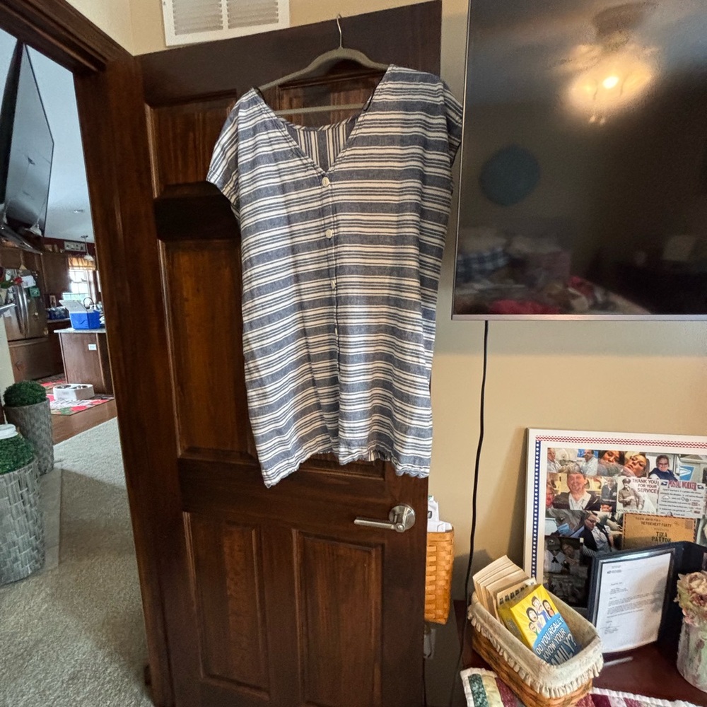 No size or brand striped cover up, I’d say xl